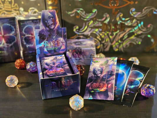 Display Prestige 2025 du jeu de cartes Rise TCG avec boosters holographiques et carte promo en français